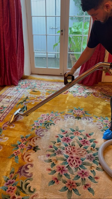 Professional Chinese rug cleaning in Islington London restoring a 25 year old oriental rug
