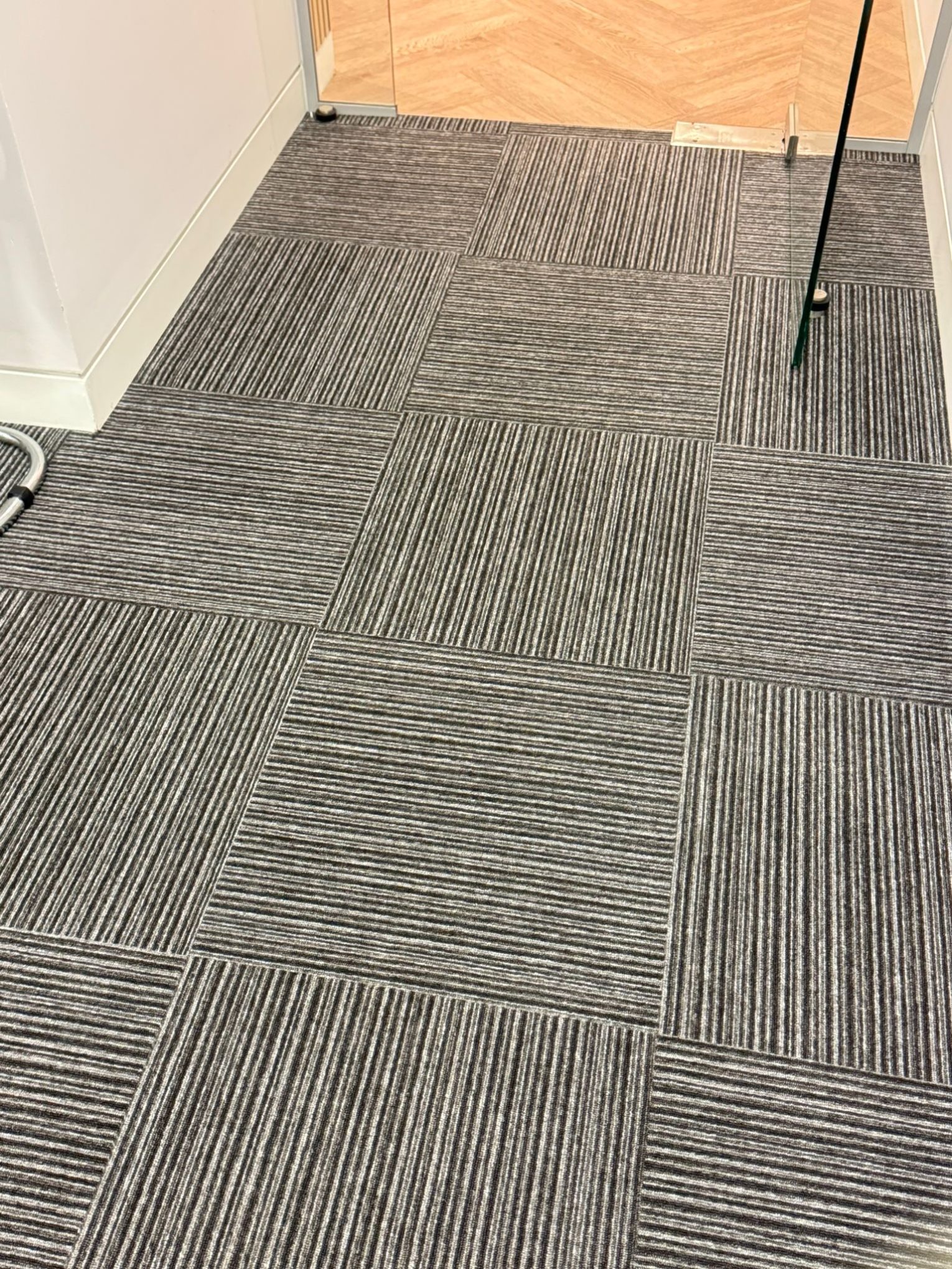 Clean and restored office carpet tiles after professional carpet cleaning in Central London