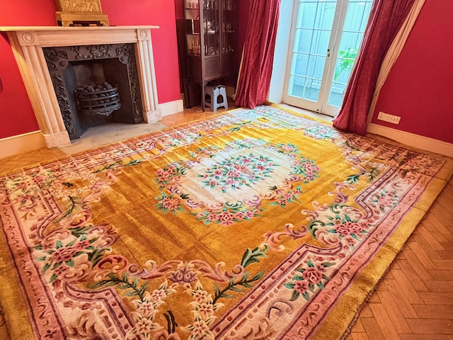 Professional cleaning of a 25 year old Chinese wool rug in Islington