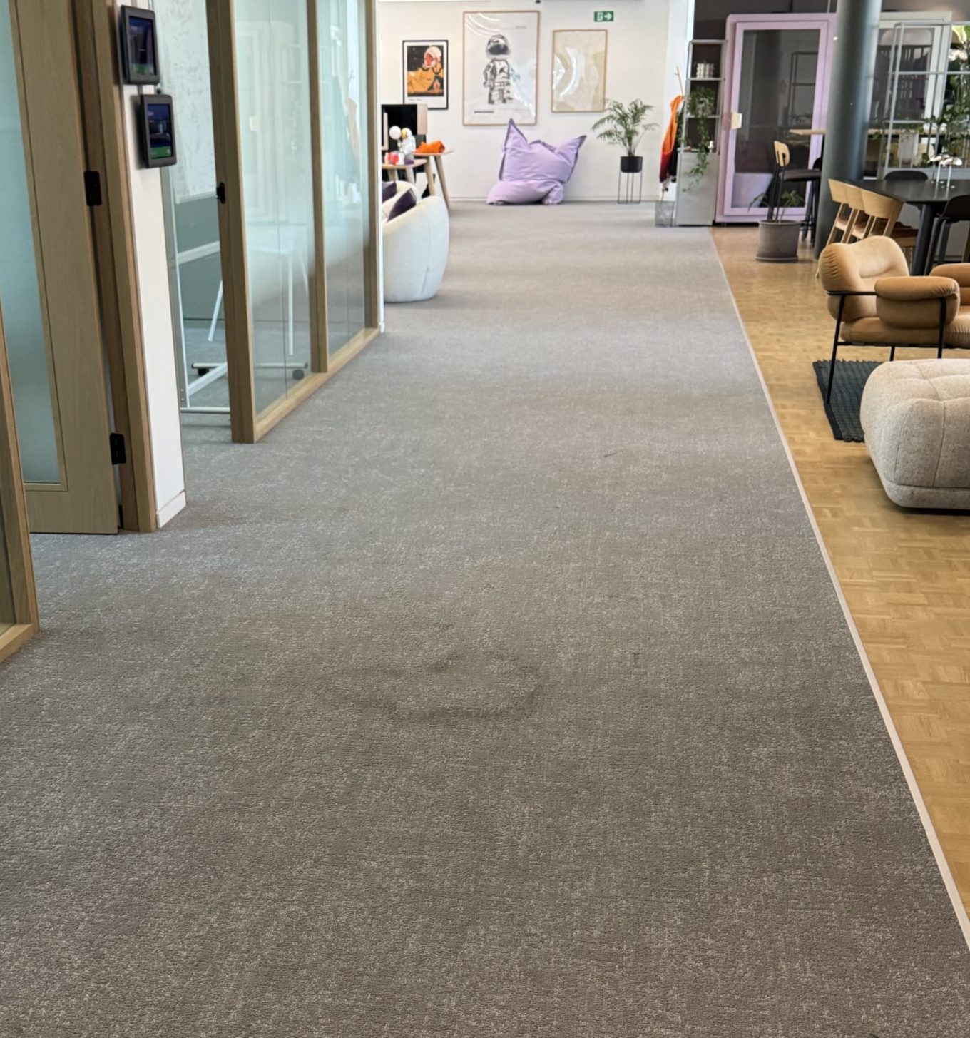 Office carpet cleaning in Central London showing high-traffic area before cleaning