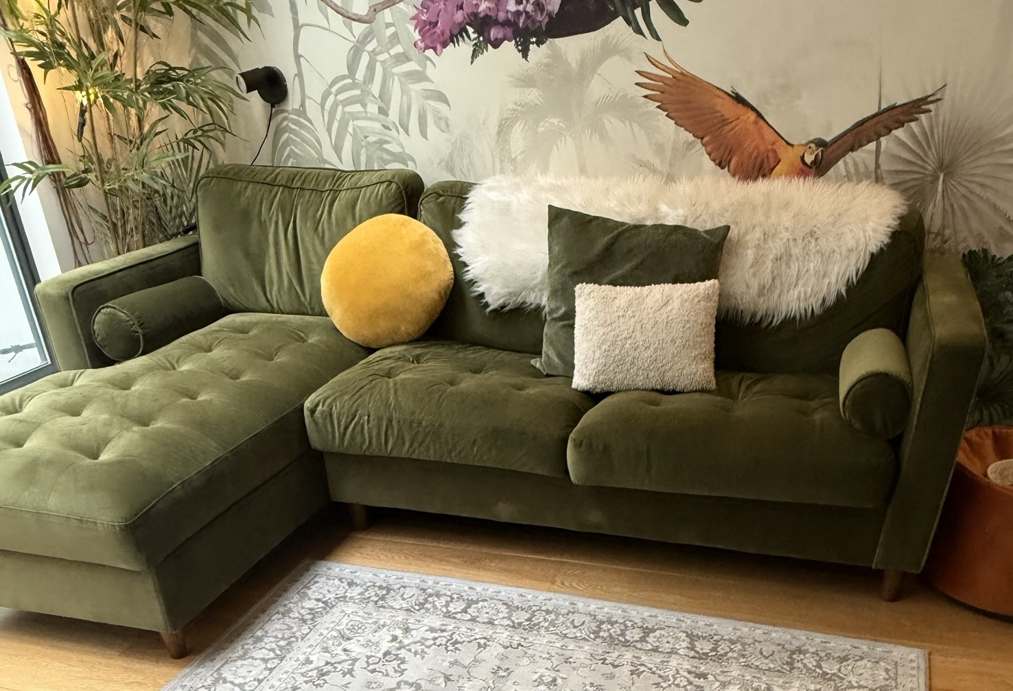 Professional green velvet sofa upholstery cleaning service in London living room