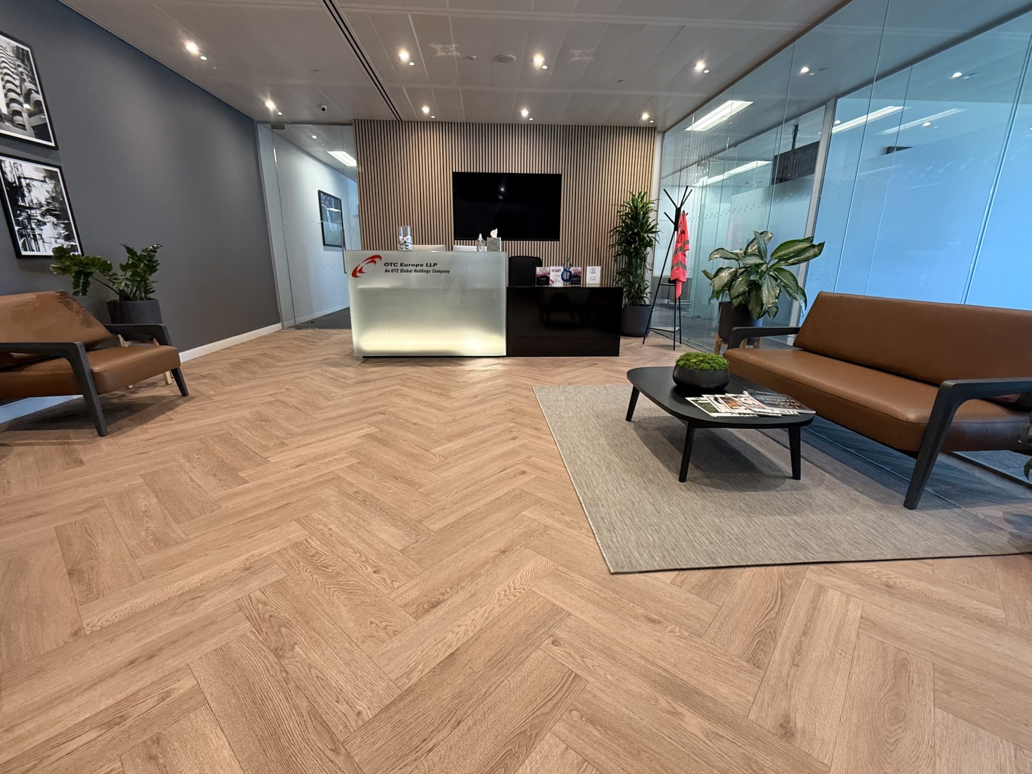 Professional commercial carpet cleaning and floor cleaning in a London office reception area